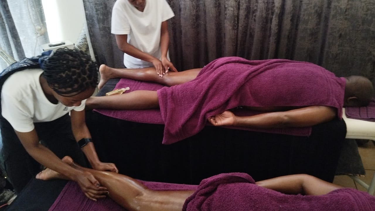Couples leg and back massage treatment