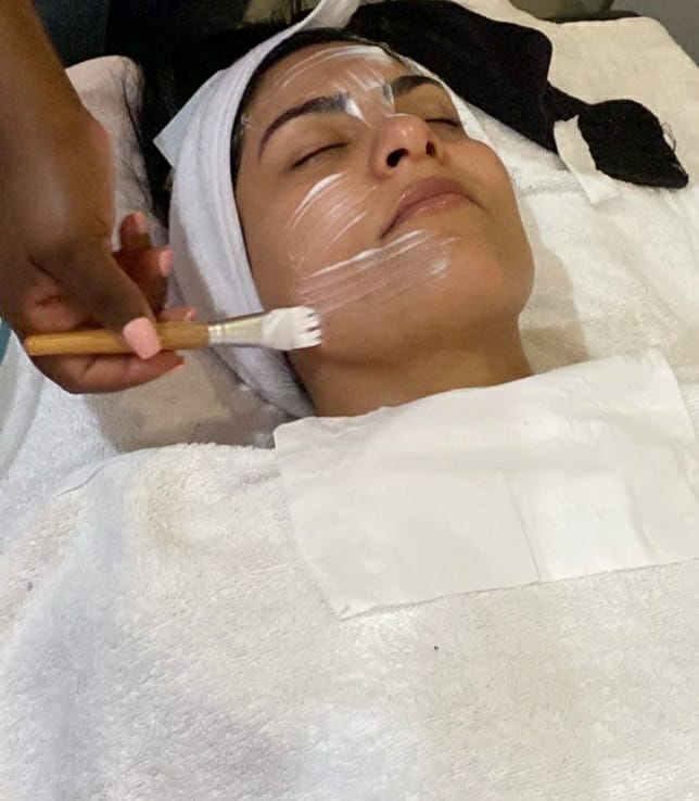 Facial mask application by Beauty by BM