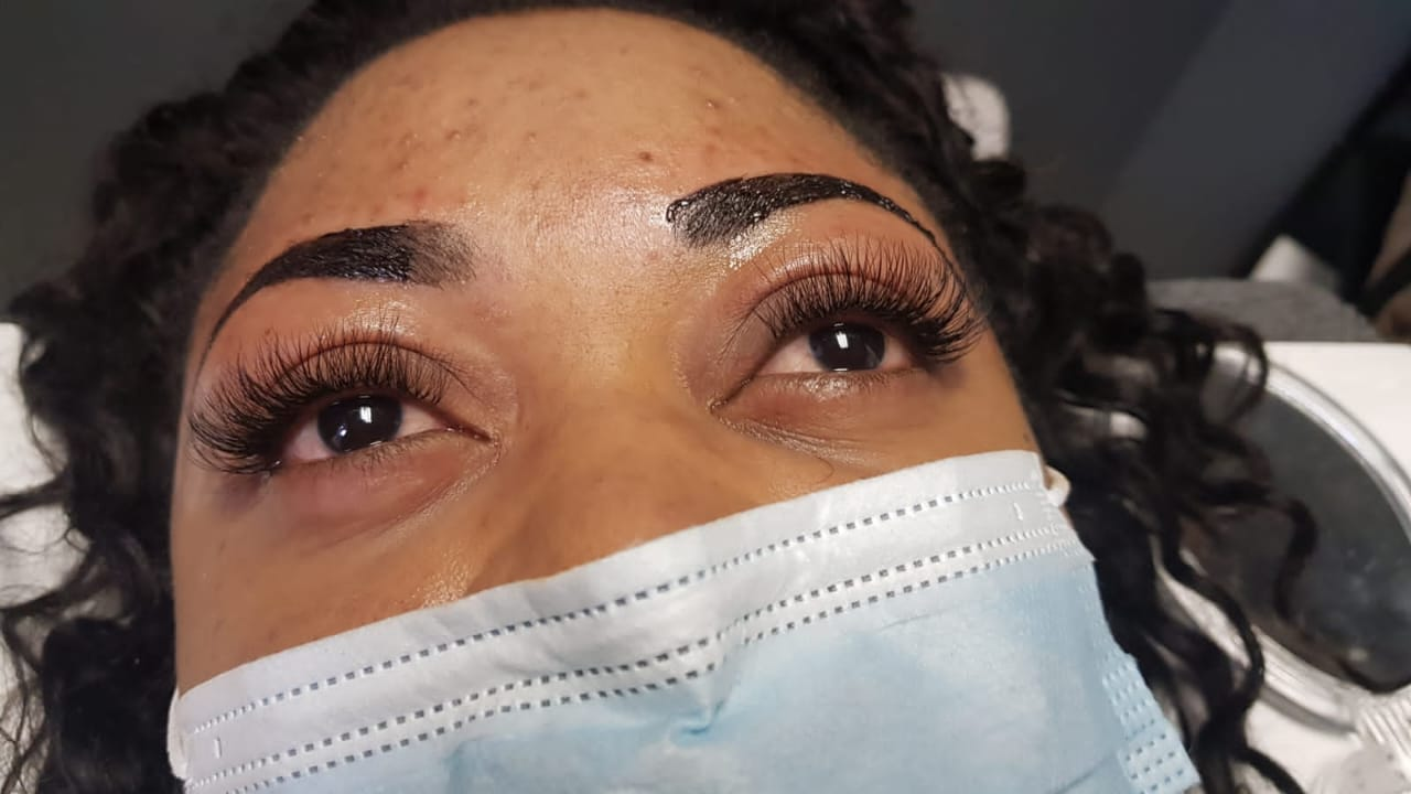 Freshly waxed and tinted brows paired with lash extensions