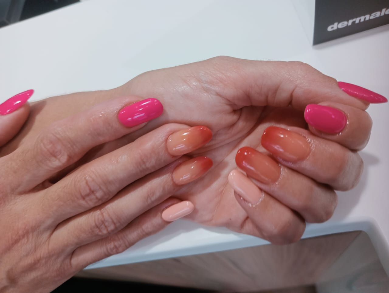 Hot pink and peach ombré acrylic tip nails