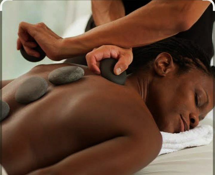 Hot stone back massage at Beauty by BM spa
