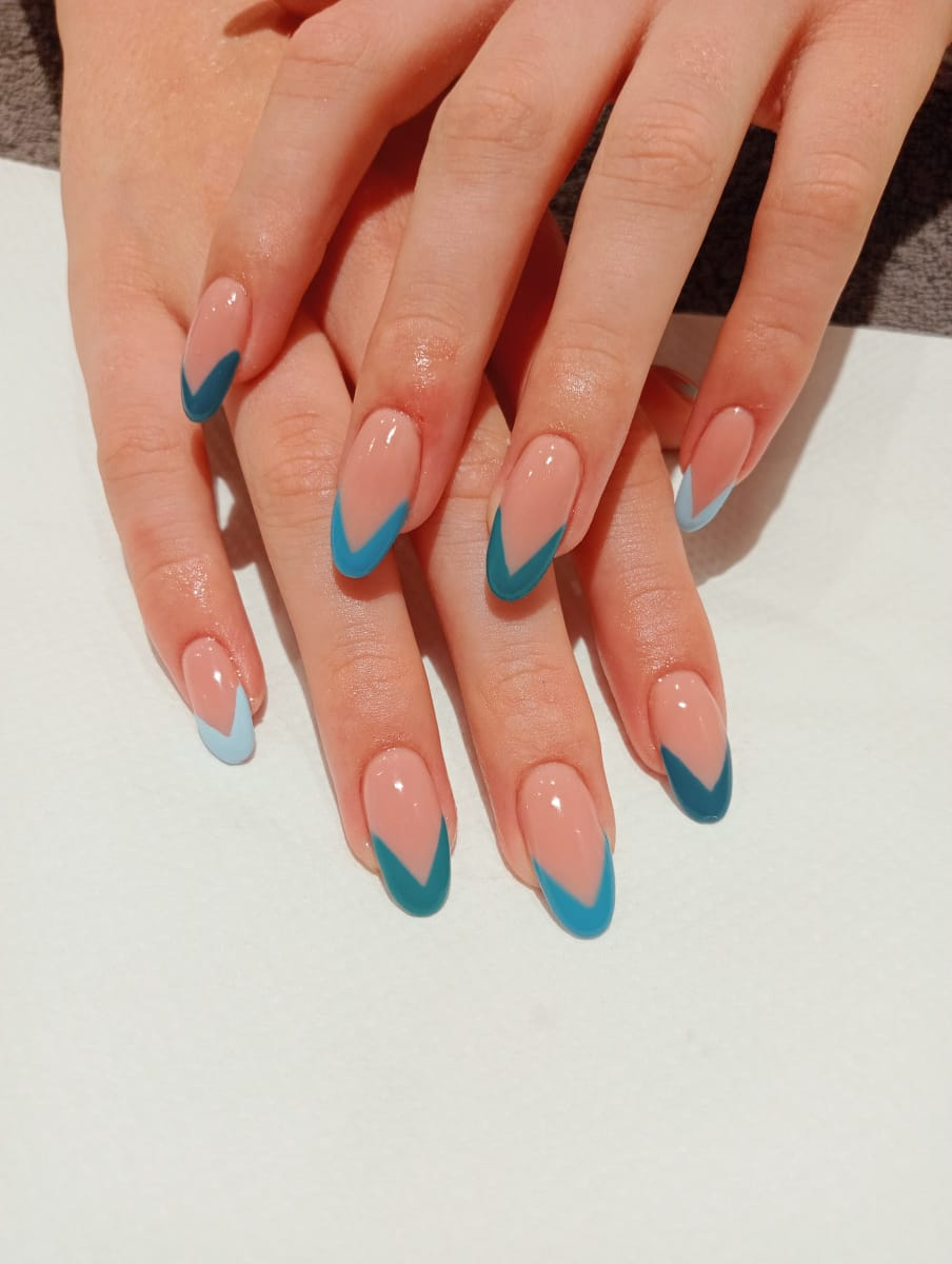 Teal and pastel blue V-shape French acrylic tip nails