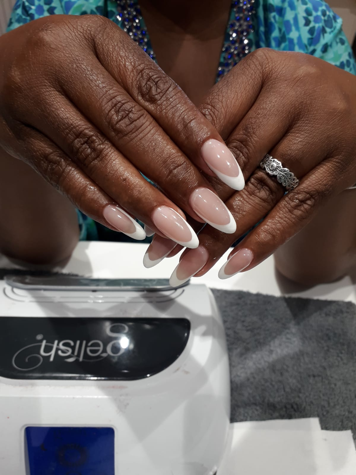 Classic white French soft gel tips with almond shape